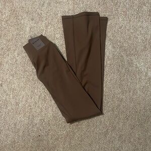 NVGTN - Espresso Effortless Flare Leggings. 
Size - M 
NEVER WORN. 
NWT.